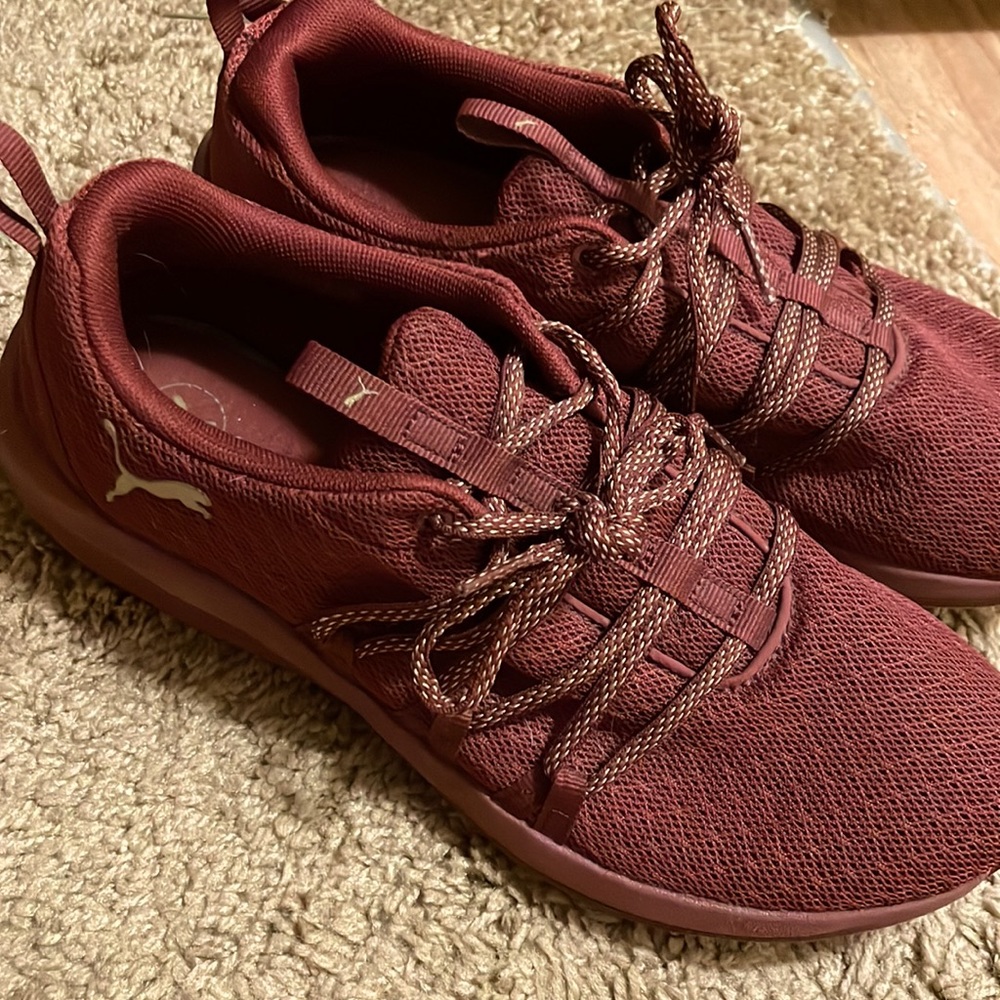 Woman’s Puma’s sneakers.